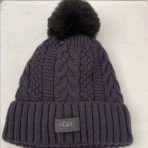 Ugg new gray bean pom pom hat with warm, soft furry inside.